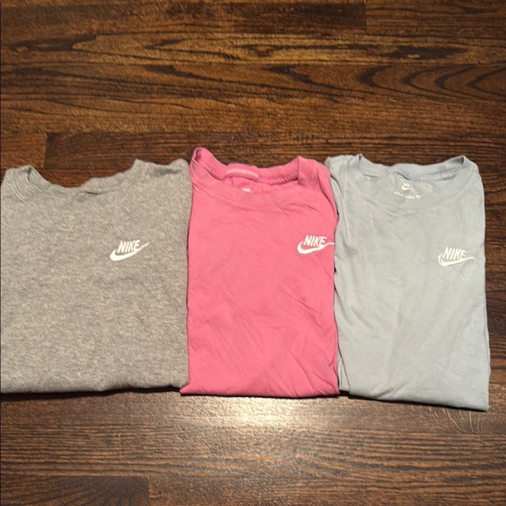 Nike Gray, Pink, and Light Blue T-Shirts. Used. Bundle of 3